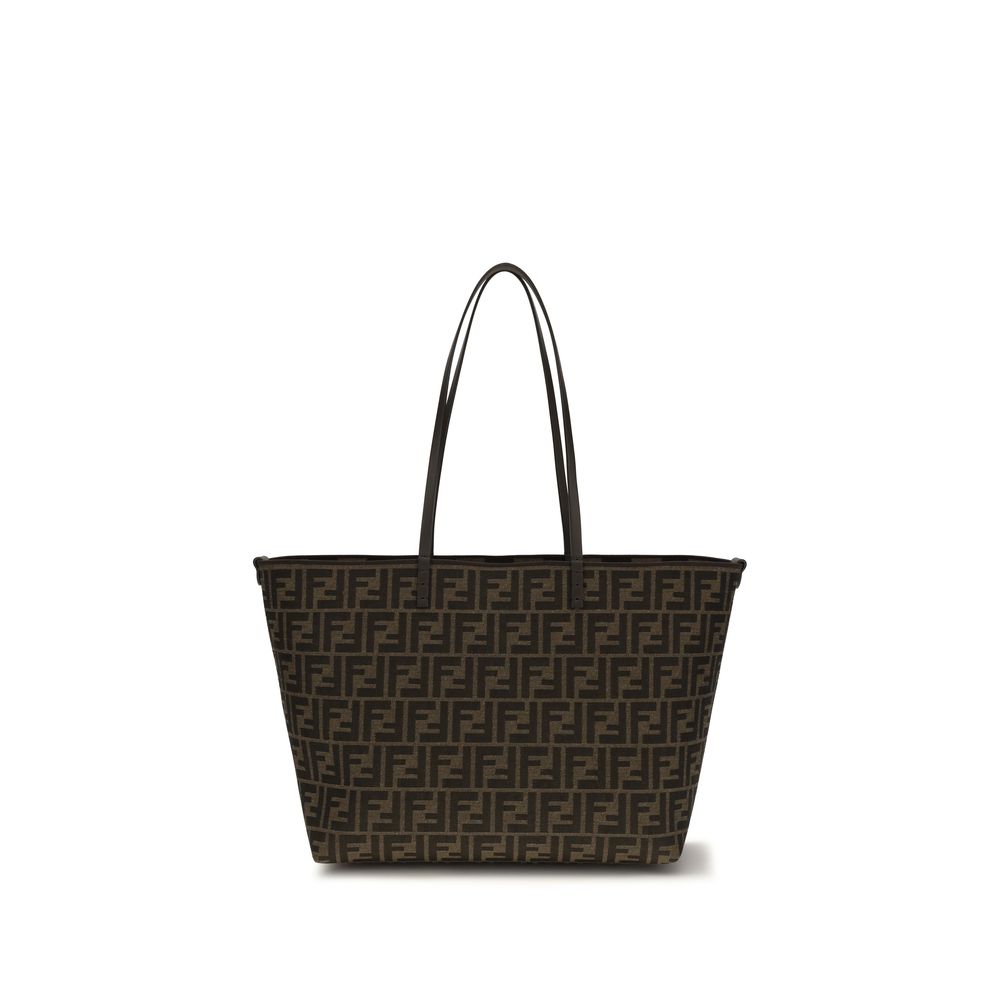 Reversible Fendi Medium Roll Shopper Bag showing tobacco brown FF jacquard on one side and a classic brown striped Pequin motif fabric on the other.
