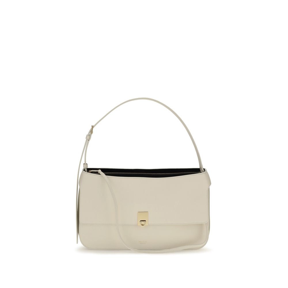 Ferragamo Small Cara Bag in Mascarpone calfskin leather featuring signature gold Hug buckle detail.