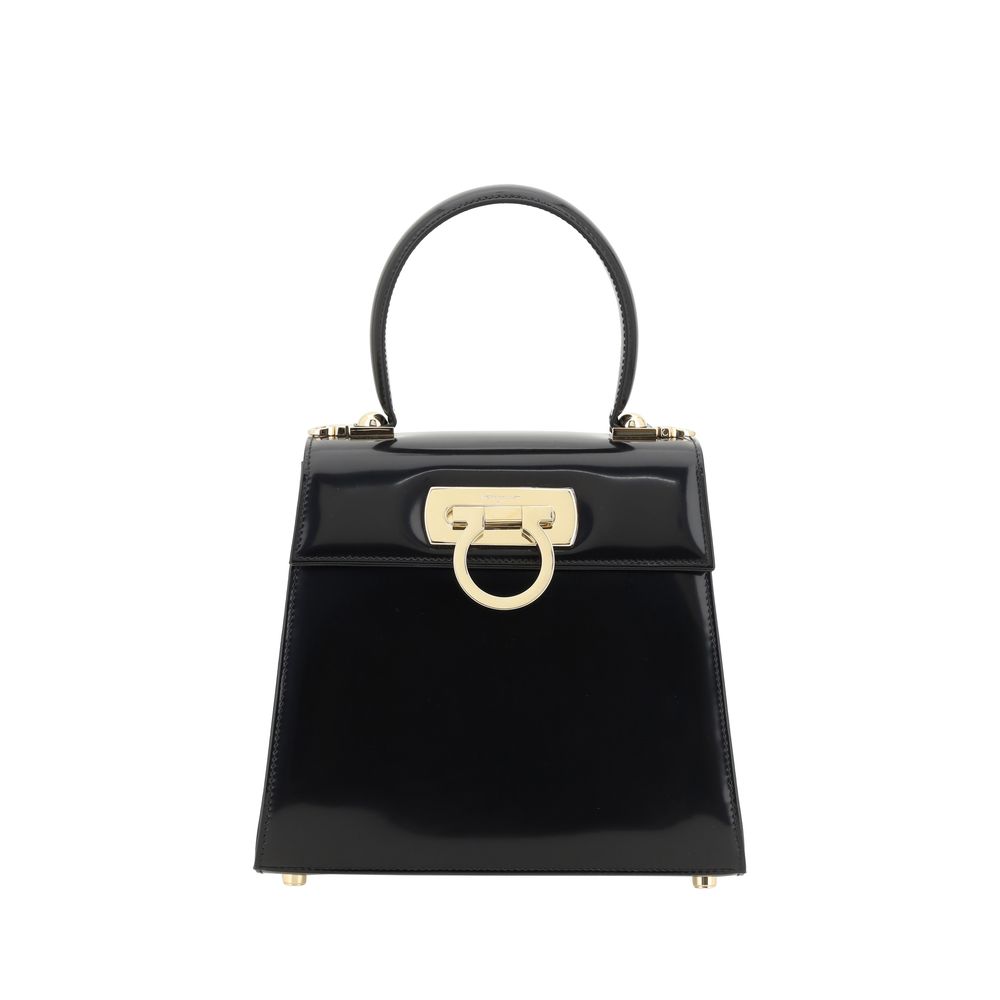 Ferragamo Iconic Small Top Handle Bag in Shiny Black brushed calfskin leather with gold-tone Gancini clasp at The Exclusive Line Singapore.