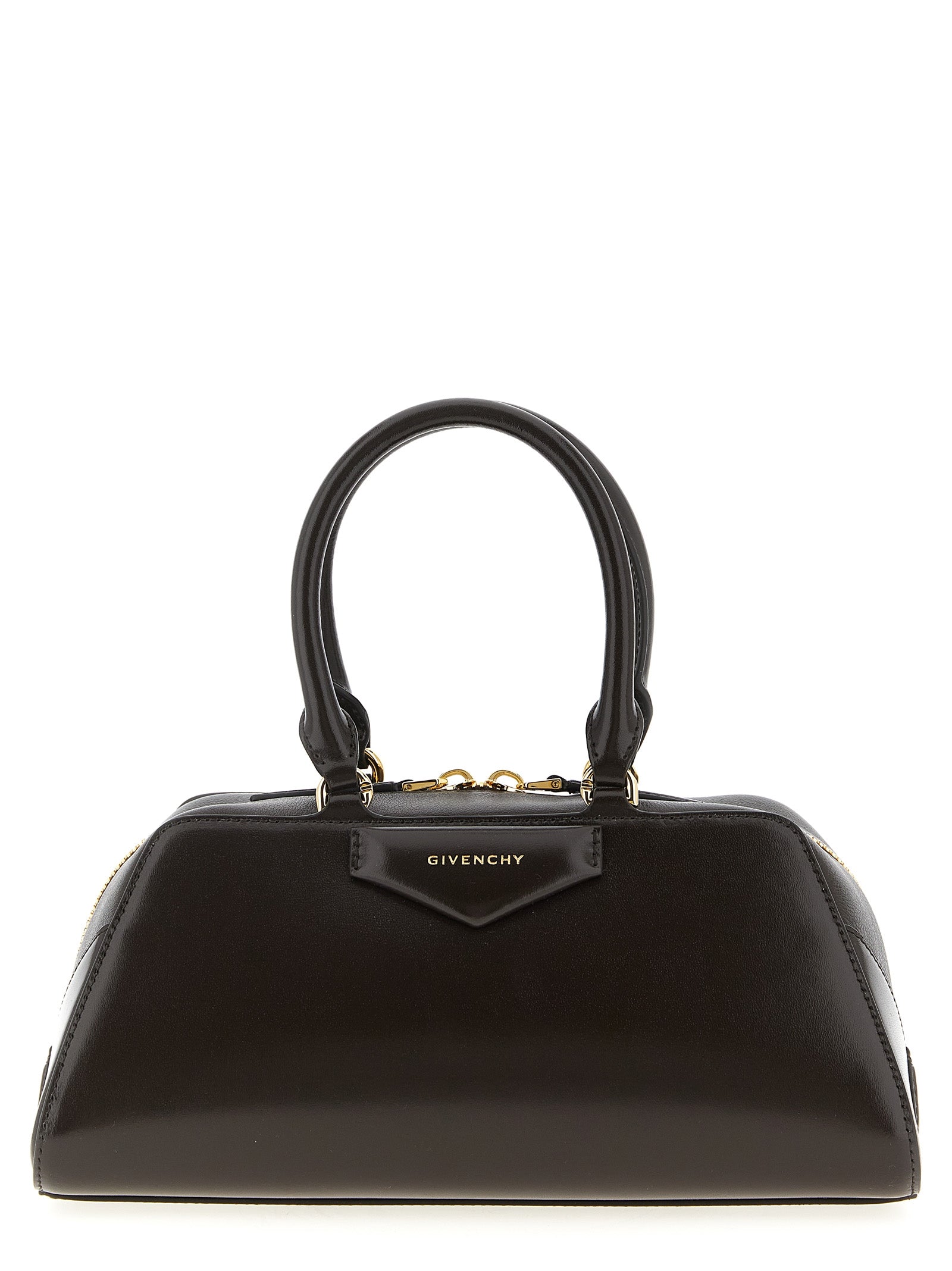 Givenchy Small Antigona East-West Bag in chocolate brown box calfskin leather featuring a pentagonal patch with gold-finish embossed signature.