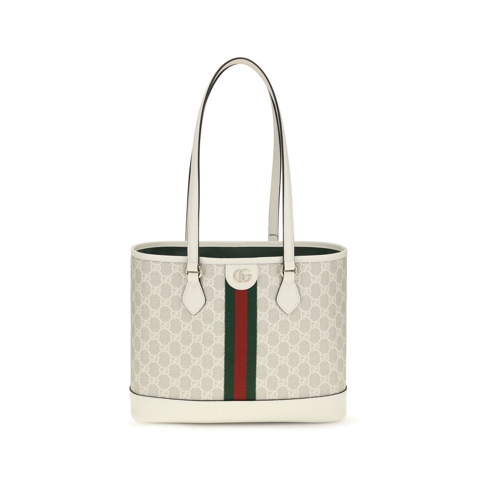 Gucci Ophidia Medium Tote Bag in beige and white GG canvas featuring long white leather shoulder straps, the classic Web stripe, and light gold-toned Double G hardware.