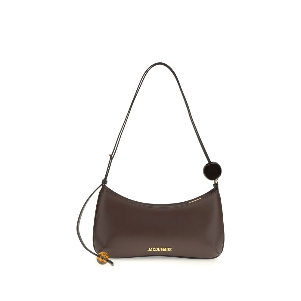 Jacquemus Le Petit Bisou Perle medium brown leather shoulder bag featuring large decorative beads on the strap and gold logo.