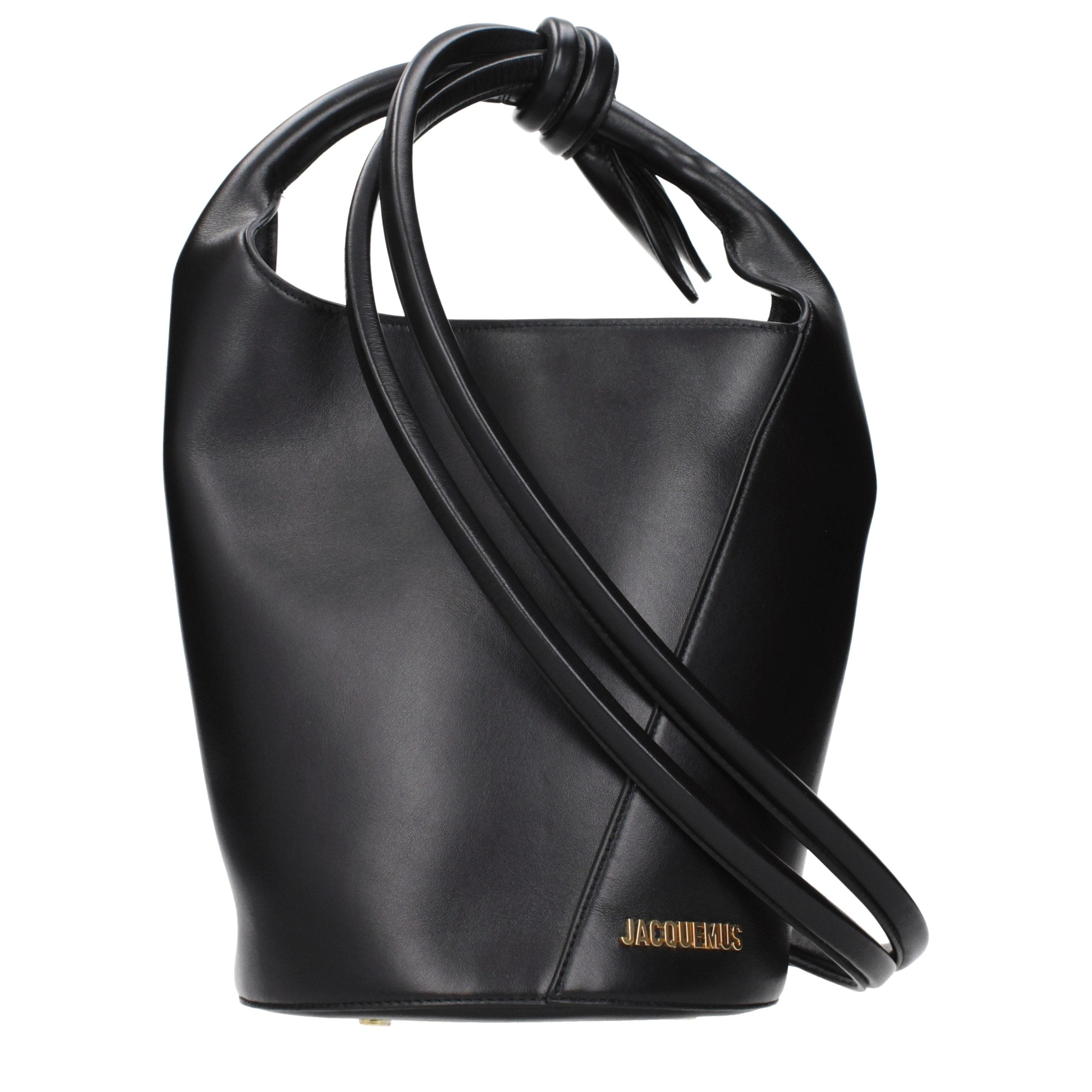 Jacquemus Le Petit Tourni black leather bucket bag with knotted handle and gold-tone logo, viewed from front.