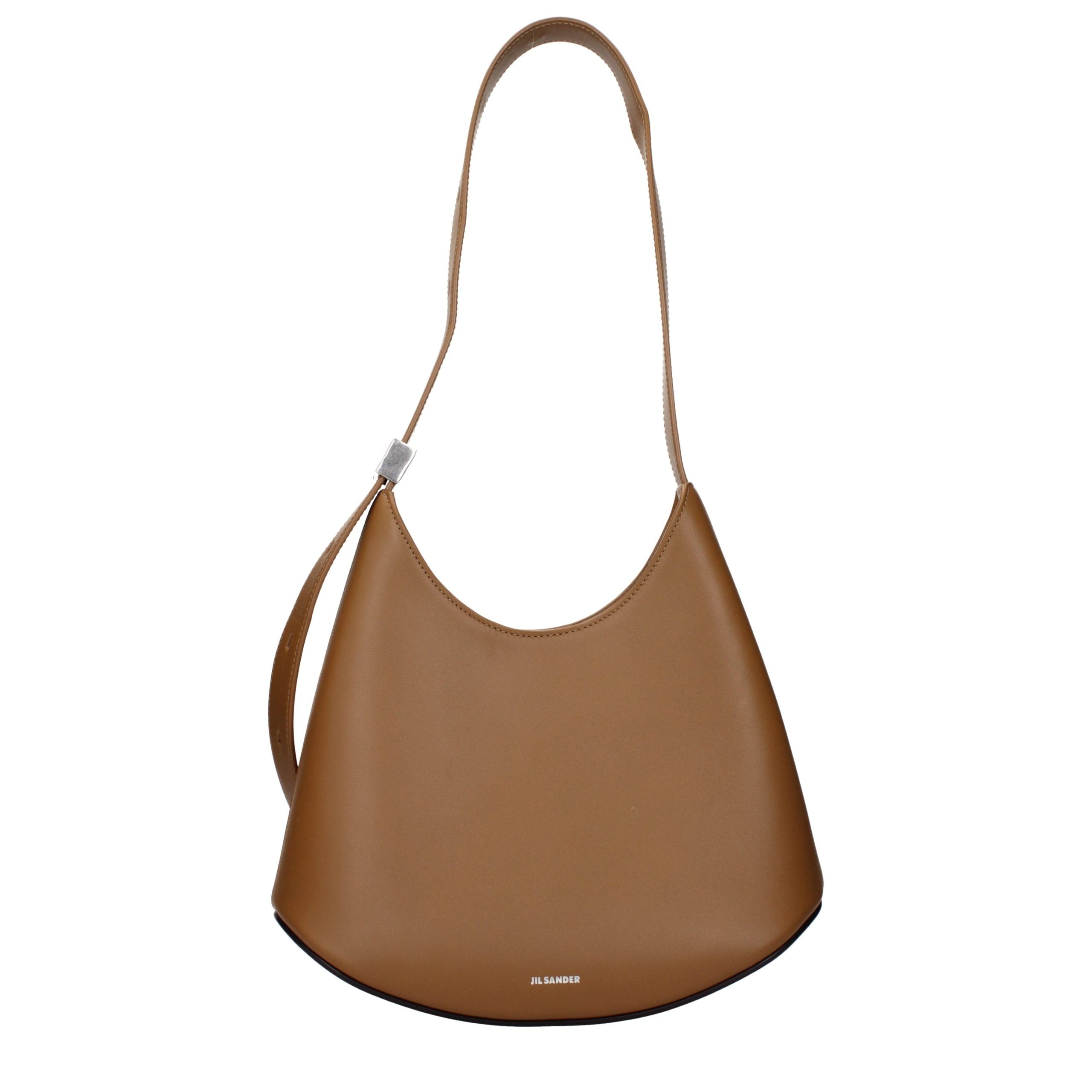 Jil Sander Eldorado Small Bag in hazelnut brown calf leather with a curved vegetable-tanned base.