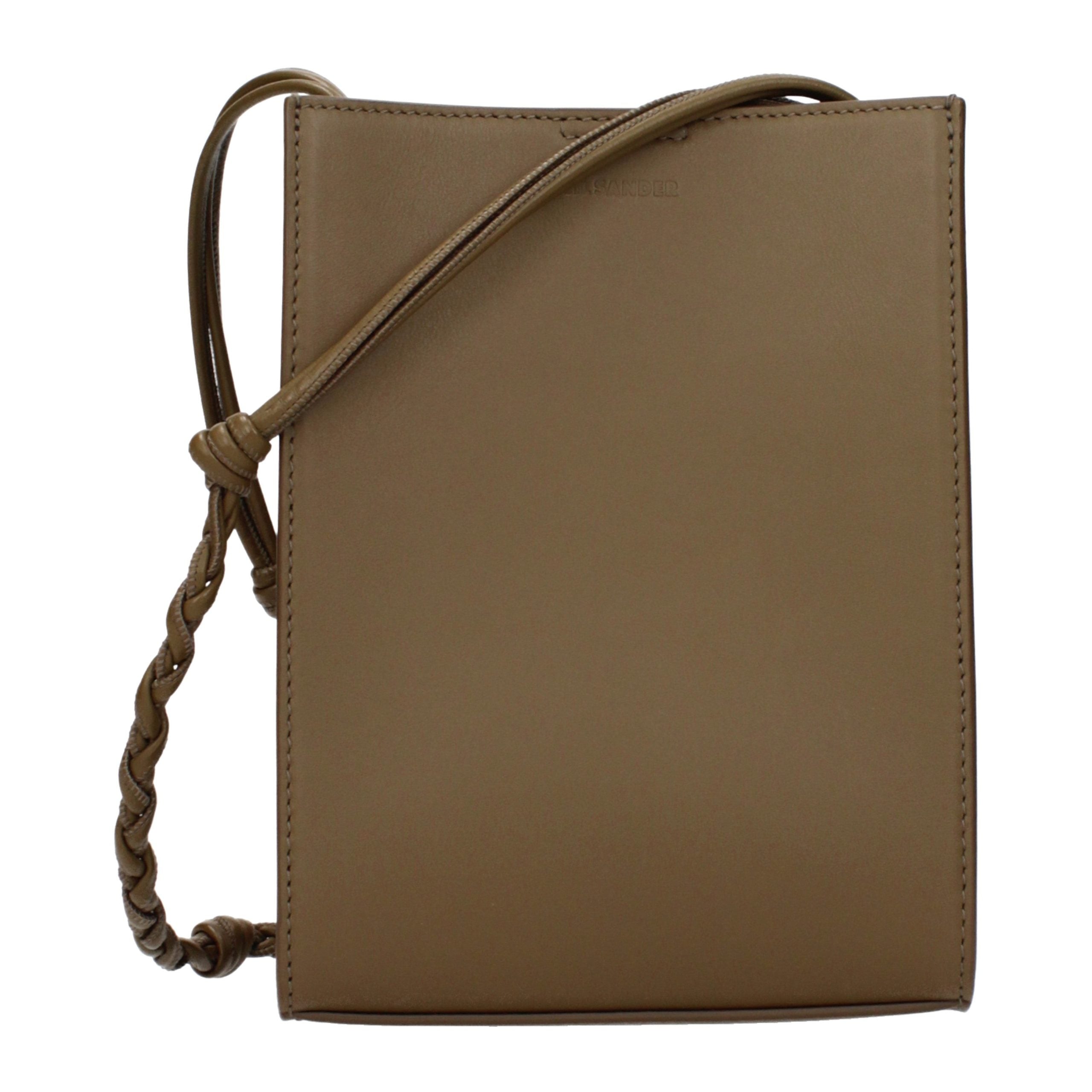 Jil Sander Tangle Small crossbody bag in rich brown calf leather with hand-knotted strap.
