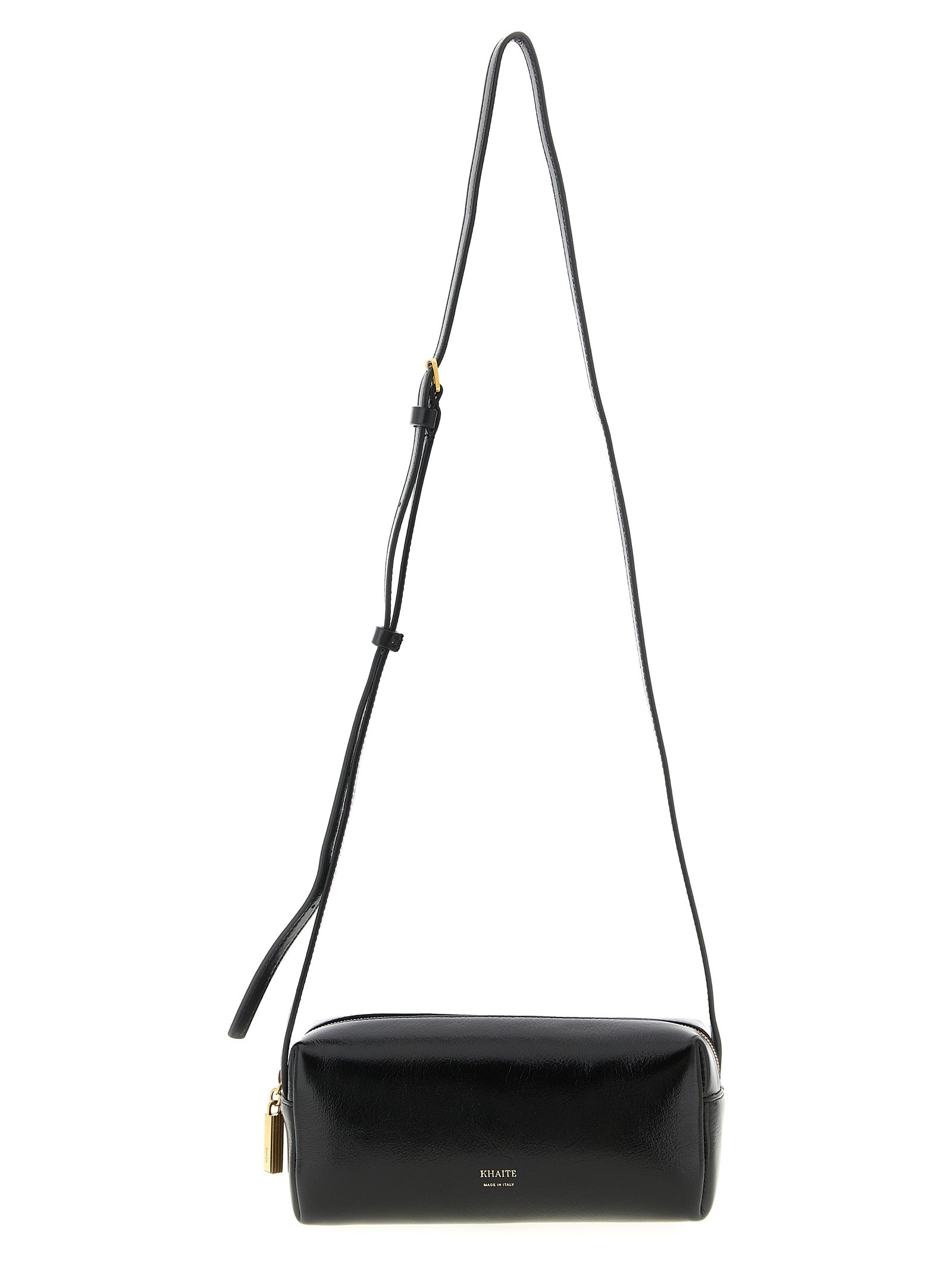 Khaite Kye Mini Crossbody Bag in sleek black calfskin leather with a structured east-west silhouette, featuring a discreet front embossed logo and an adjustable shoulder strap.