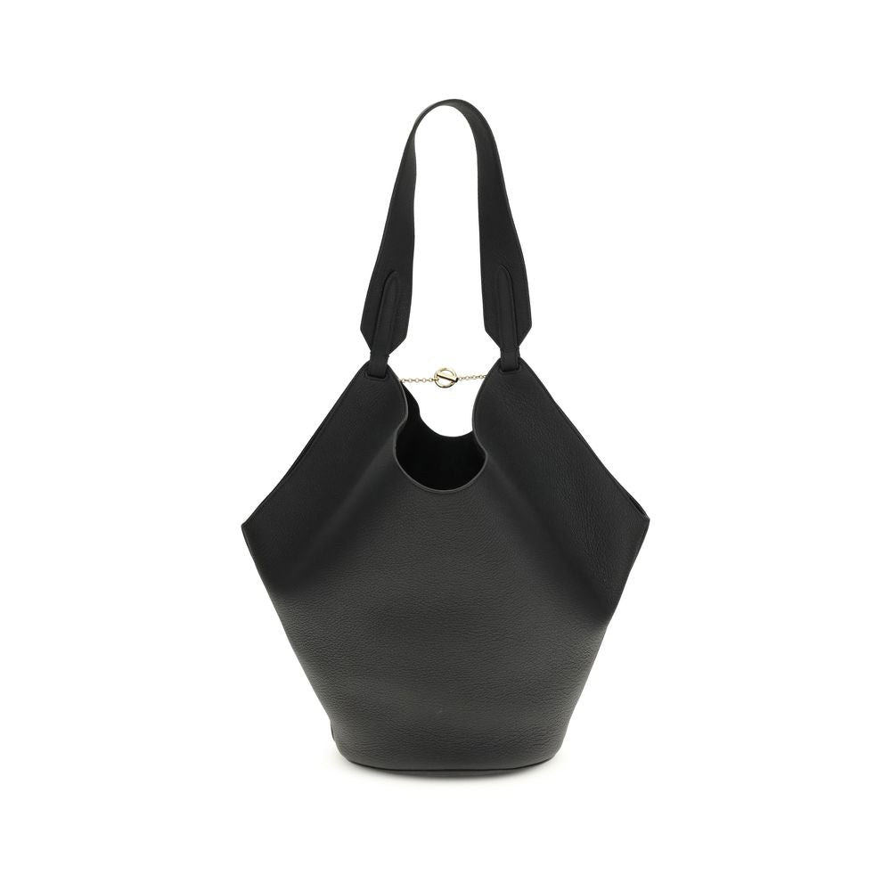 Khaite Small Lotus Tote in black pebbled leather, featuring its sculptural scarf-inspired shape and top handles.