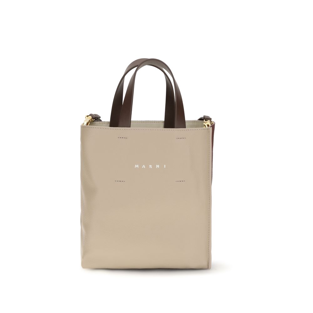 Marni Museo Soft mini tote bag in Moon Stone, Dark Burgundy, and Coffee leather with twin handles and detachable strap.