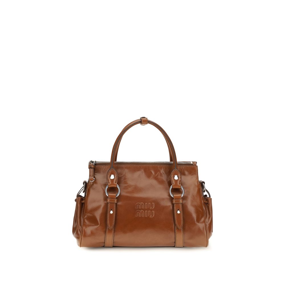 Front view of Miu Miu glossy leather handbag in palisander brown with raised logo and side pockets.