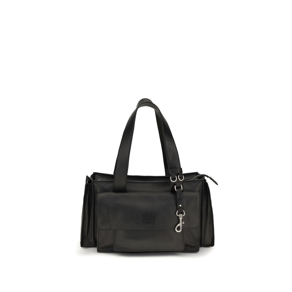 Miu Miu Utilitaire Shopping Bag in black antiqued nappa leather featuring exterior utility pockets and dark steel hardware.