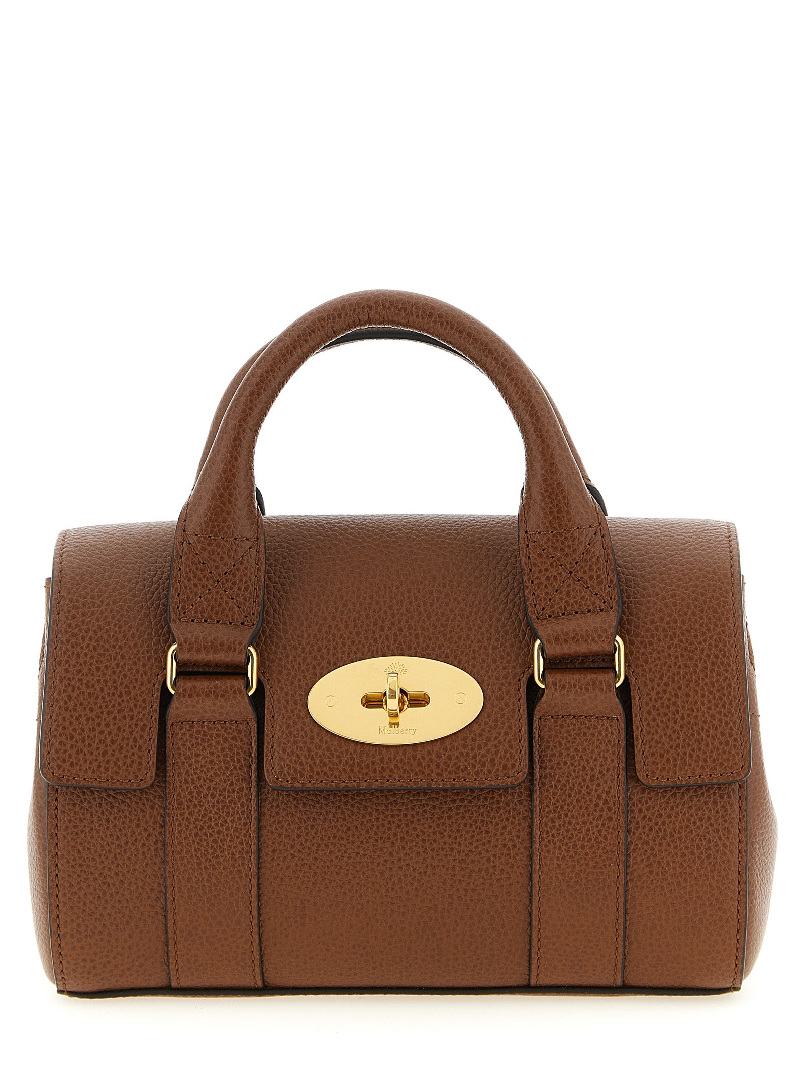 Mulberry Mini Bayswater handbag in Oak classic grain leather featuring a brass Postman’s Lock, dual top handles, and a detachable crossbody strap from The Exclusive Line Singapore.