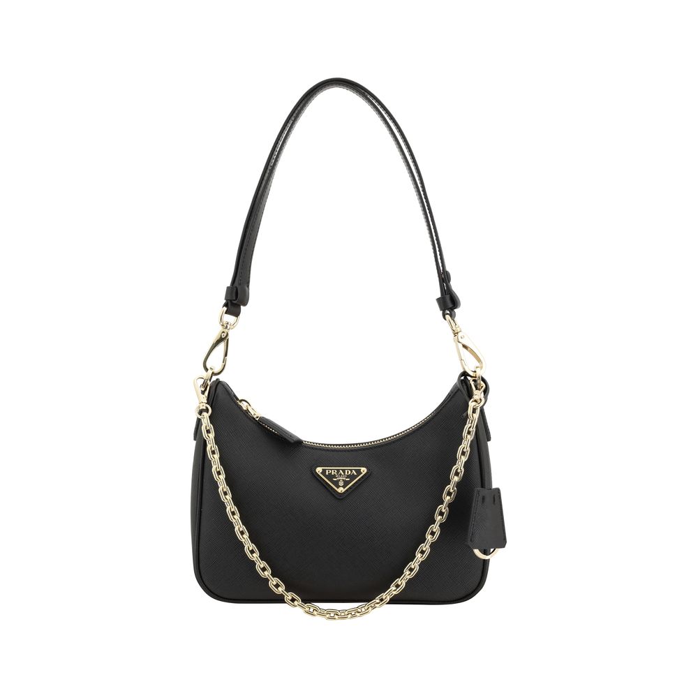 Prada Re-Edition Mini Saffiano Leather Bag in Black with enameled triangle logo and detachable chain handle.