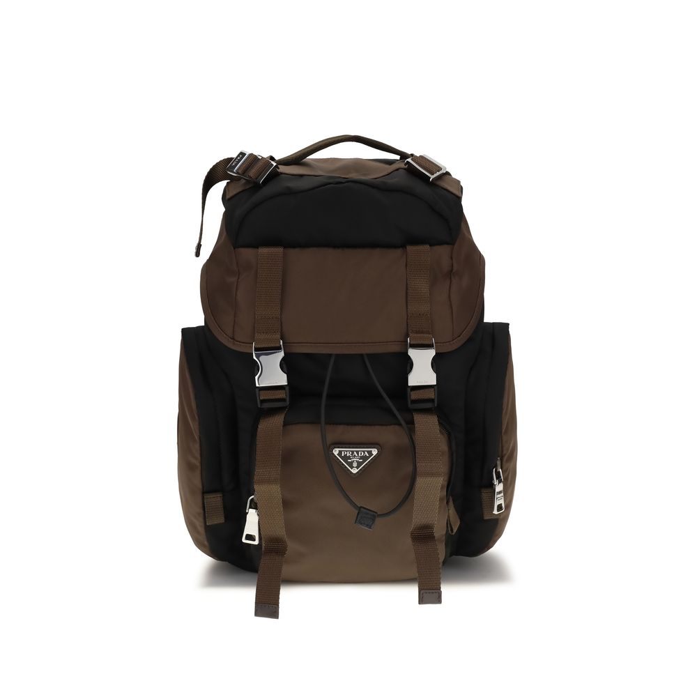 Prada compact Re-Nylon backpack in black with burnt orange detailing, showcasing external zipper pockets and the iconic enameled triangle logo.