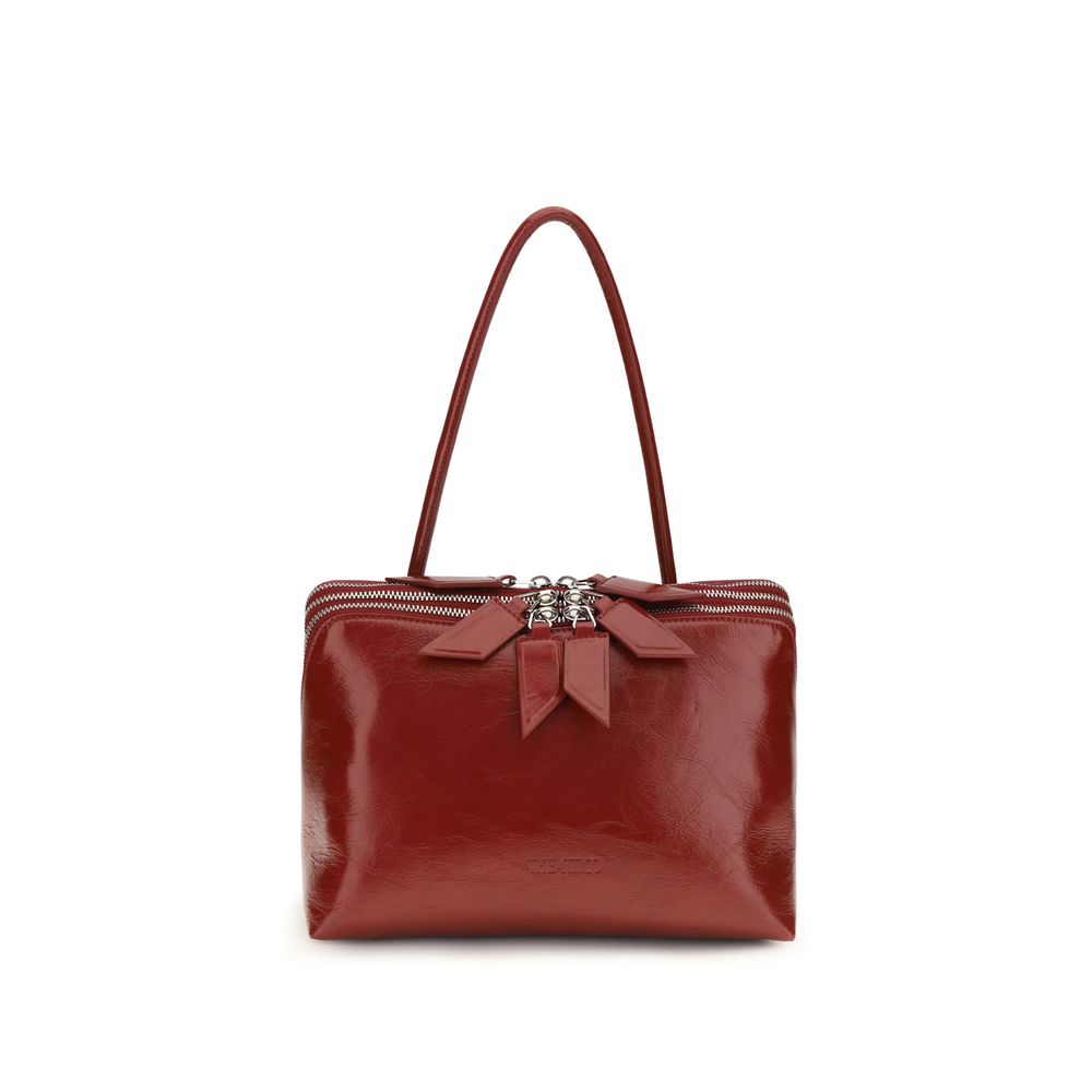 The Attico L'Altra di Milano Shoulder Bag in deep red crackled patent leather with tonal red suede lining.