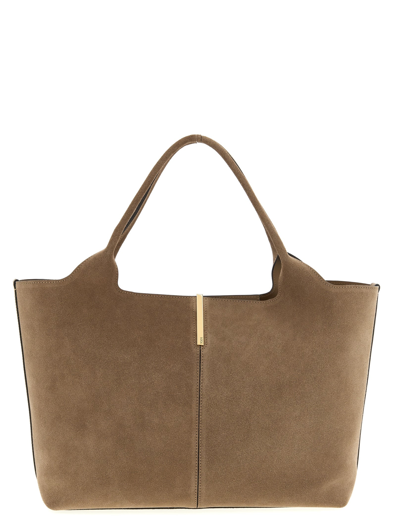 Tod's Medium-Small Shopping Bag in brown suede calfskin leather featuring vertical central stitching, a branded metal bar accessory, and dual top handles from The Exclusive Line Singapore.