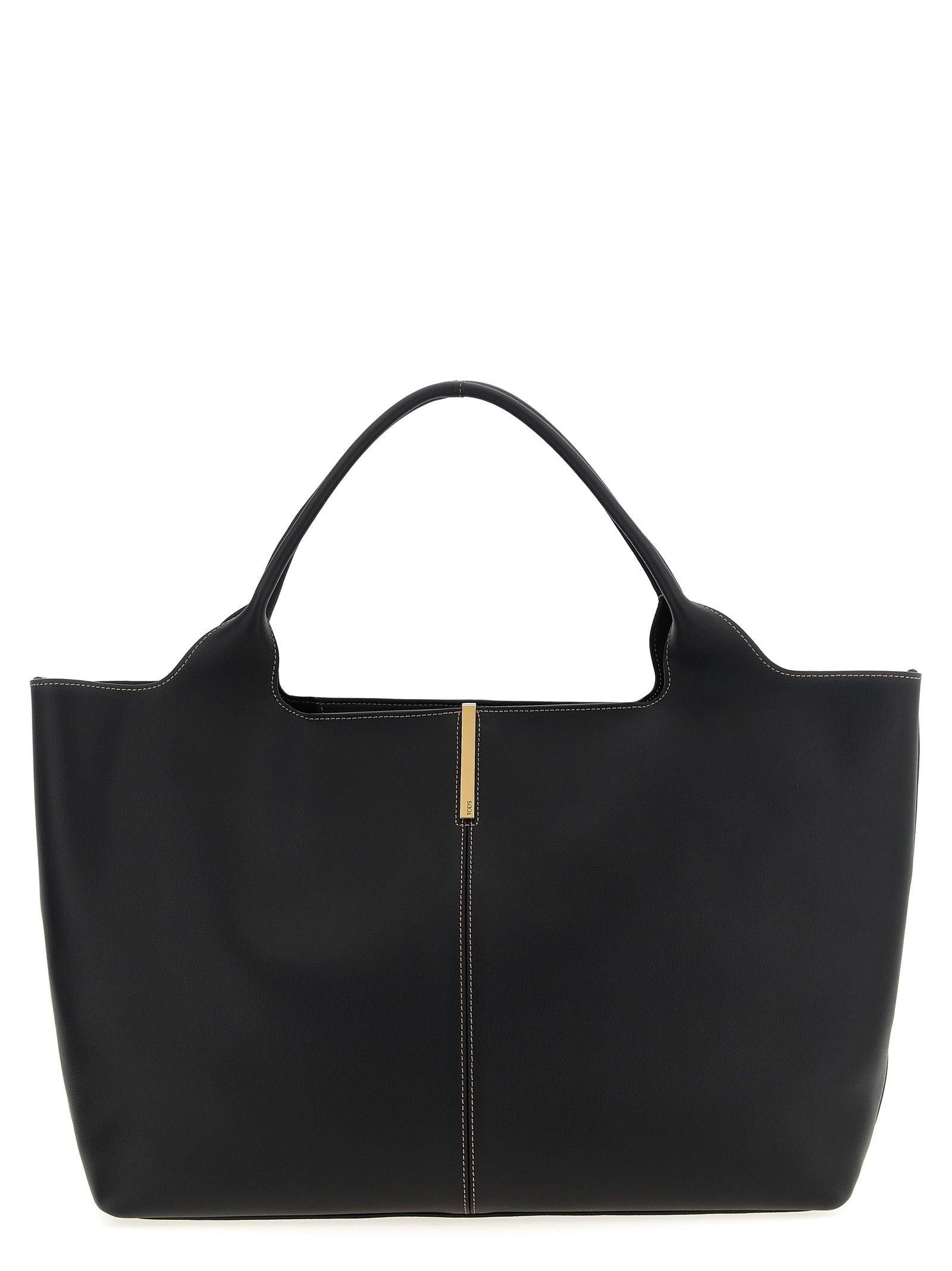 Tod's Medium Shopping Bag in black calfskin leather featuring vertical central stitching, a branded metal bar accessory, and dual top handles from The Exclusive Line Singapore.