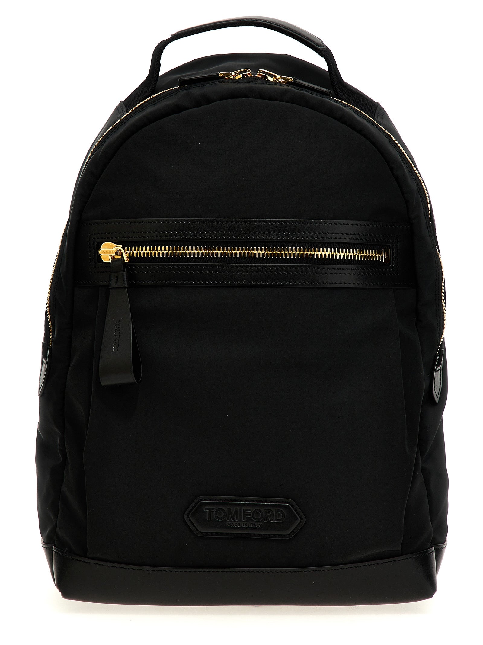 Tom Ford recycled nylon backpack in matte black featuring premium Italian calf leather trim, bold gold-tone zippers, and an embossed front logo patch detailing.