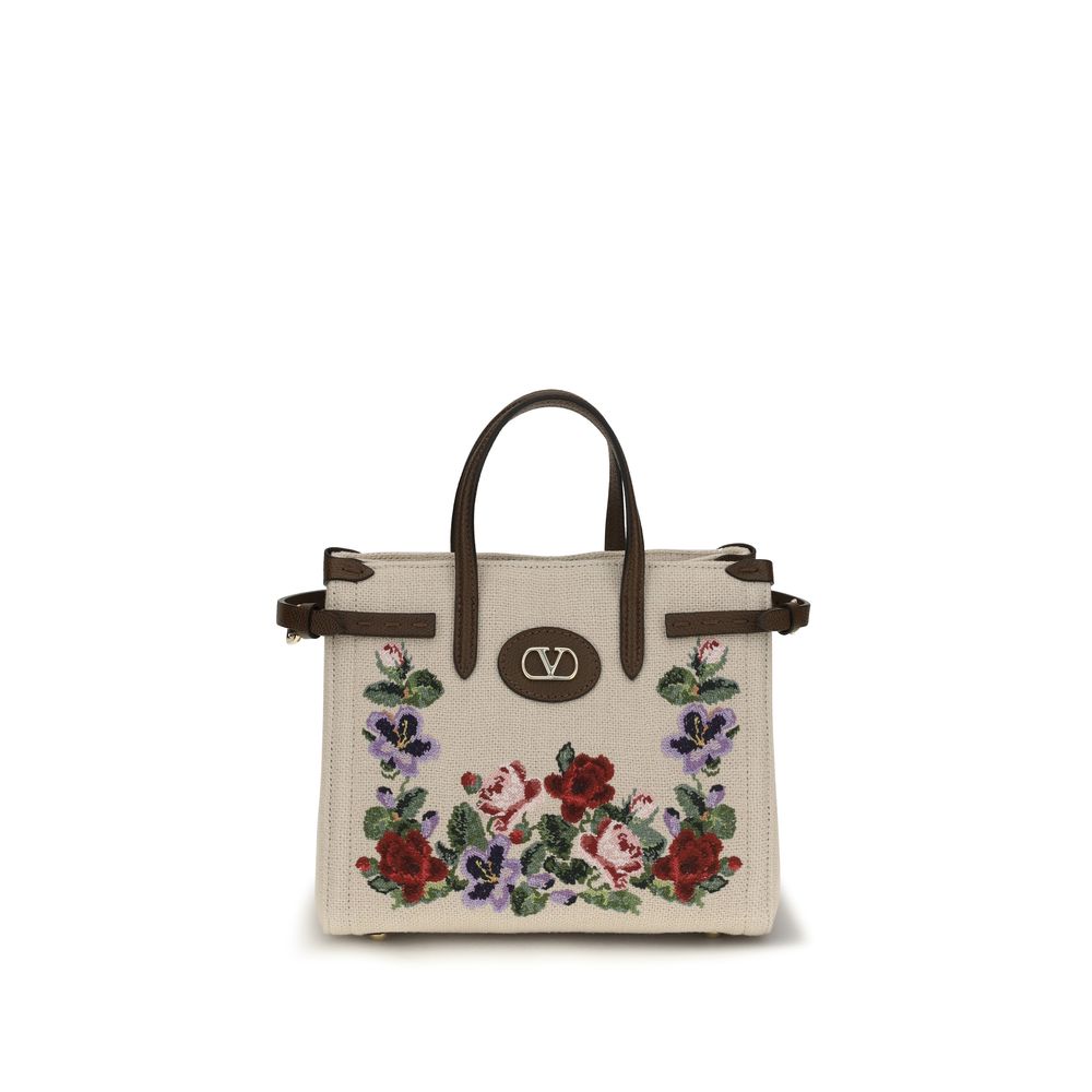 Valentino Garavani Antibes small embroidered linen shopping bag in ecru with floral motif and gold VLogo.