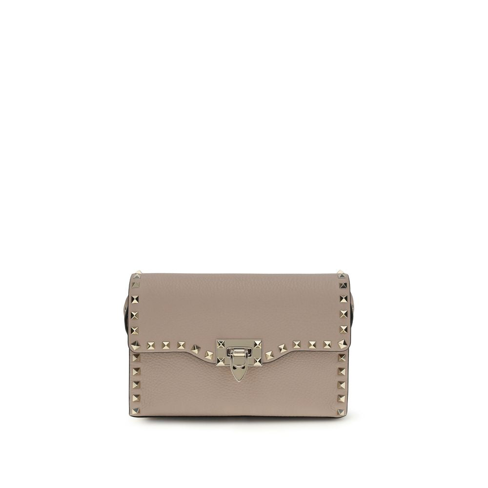 Valentino Garavani Rockstud Small Crossbody Bag in Poudre Calfskin from The Exclusive Line Singapore.
